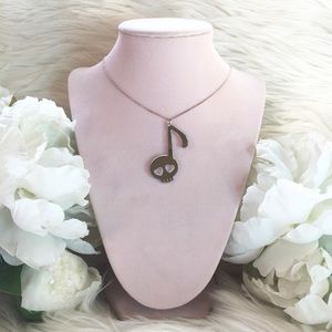 Hello Drama Skull Music Note Lucite Necklace